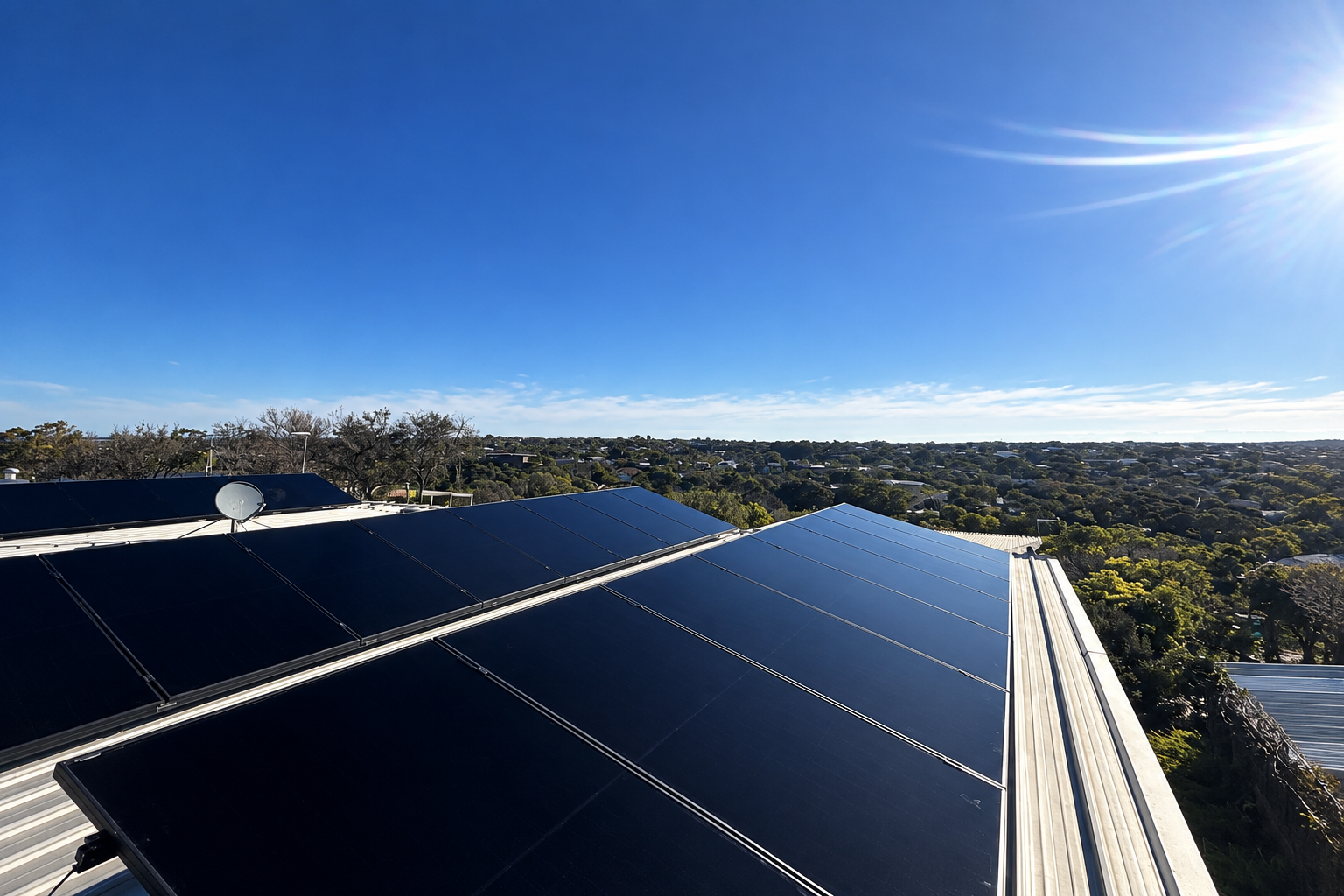 Completed rooftop solar panels with a view across the Mornington Peninsula