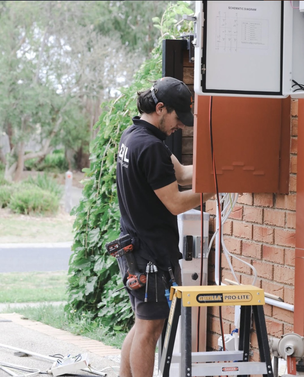 DNL electrician attending to a residential switchboard